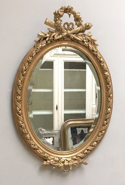 FRENCH ANTIQUE CRESTED OVAL MIRROR